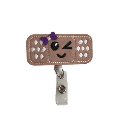 Bandage with Purple Bow Badge Reel