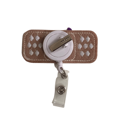 Bandage with Purple Bow Badge Reel – ScribePad